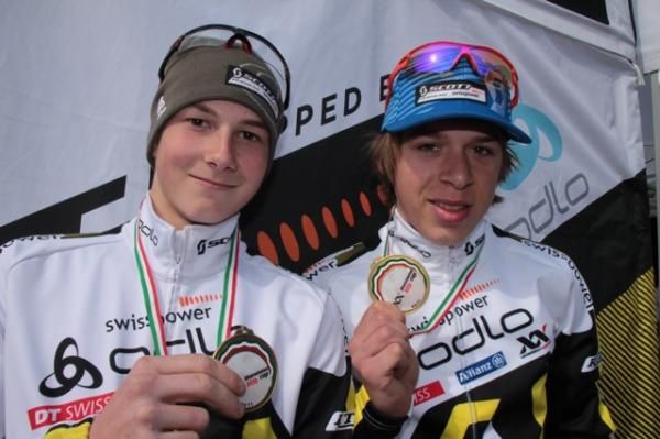 Scott Swisspower junior teammates Dominic Zumstein and Andri Frischknecht show off their medals.