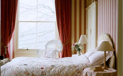 Red curtian in a traditional bedroom