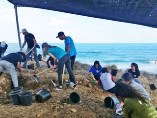 Local youth participate in excavations in Ashkelon, Israel. The team uncovered Ottoman-era buildings, including a lookout tower and a fisherman's house.