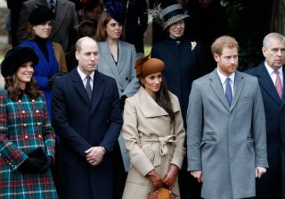 Britain's Catherine, Duchess of Cambridge, (L) and Britain's Prince William, Duke of Cambridge, (2L), US actress and fiancee of Britain's Prince Harry Meghan Markle (2R) and Britain's Prince Harry (R) stand together as they wait to see off Britain's Queen Elizabeth II after attending the Royal Family's traditional Christmas Day church service at St Mary Magdalene Church in Sandringham, Norfolk, eastern England, on December 25, 2017. / AFP PHOTO / Adrian DENNIS (Photo credit should read ADRIAN DENNIS/AFP via Getty Images)