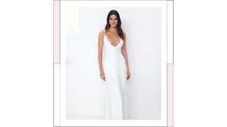 Kendall Jenner wears a long white, sequin dress as she attends the 2022 CFDA Awards at Casa Cipriani on November 07, 2022 in New York City.