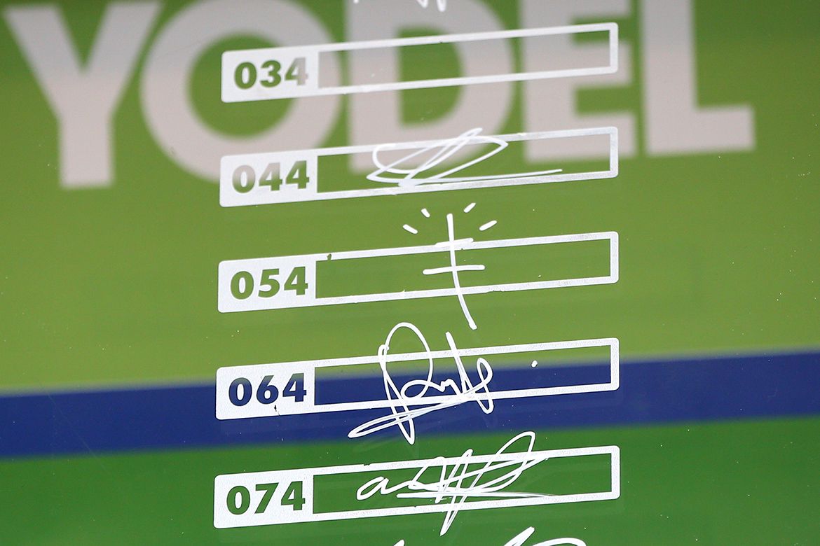 Of course, it's Taylor Phinney who signs his name with a symbol.