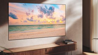 Samsung QN90B TV over wooden stand