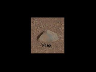 This close-up image shows the first rock target, called N165, NASA's Curiosity rover aims to zap with its Chemistry and Camera (ChemCam) laser instrument. Image taken Aug. 8, 2012. Released Aug. 17.