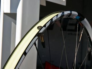 The alloy WTB Stryker rims use airtight rim tape to seal up the spoke holes.