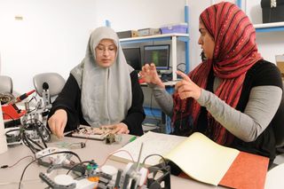 Early in the process, Mason engineering students Salma Mahmoud and Sidra Khan worked on the circuitry that runs the device.