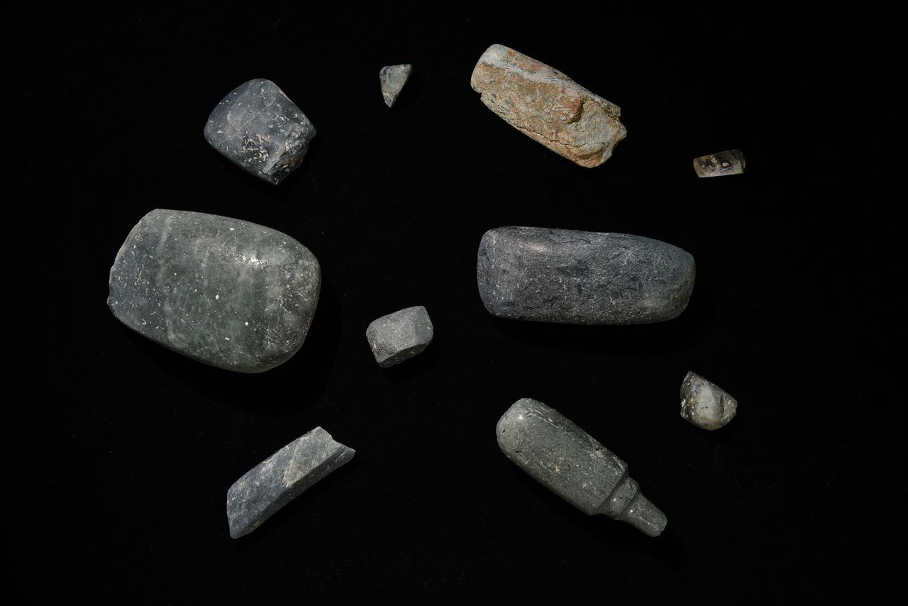 A greenstone axe cache unearthed at Aguada F&eacute;nix dating to the early Middle Preclassic (1000-700 B.C.).