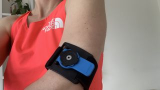 Runner's arm wearing the Quad Lock armband