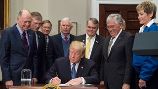 President Trump signing the Space Policy Directive