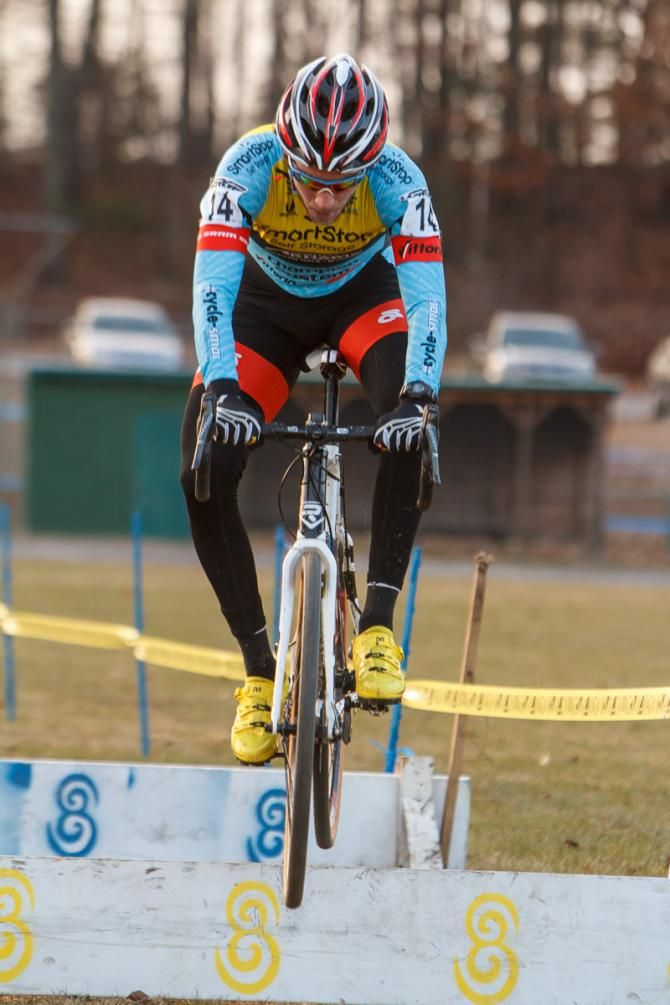 Travis Livermon (Team SmartStop/Mountain Khakis) hops the barriers