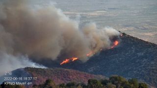 A view of the Contreras Fire burning the slopes of Kitt Peak mountain on June 16, 2022.