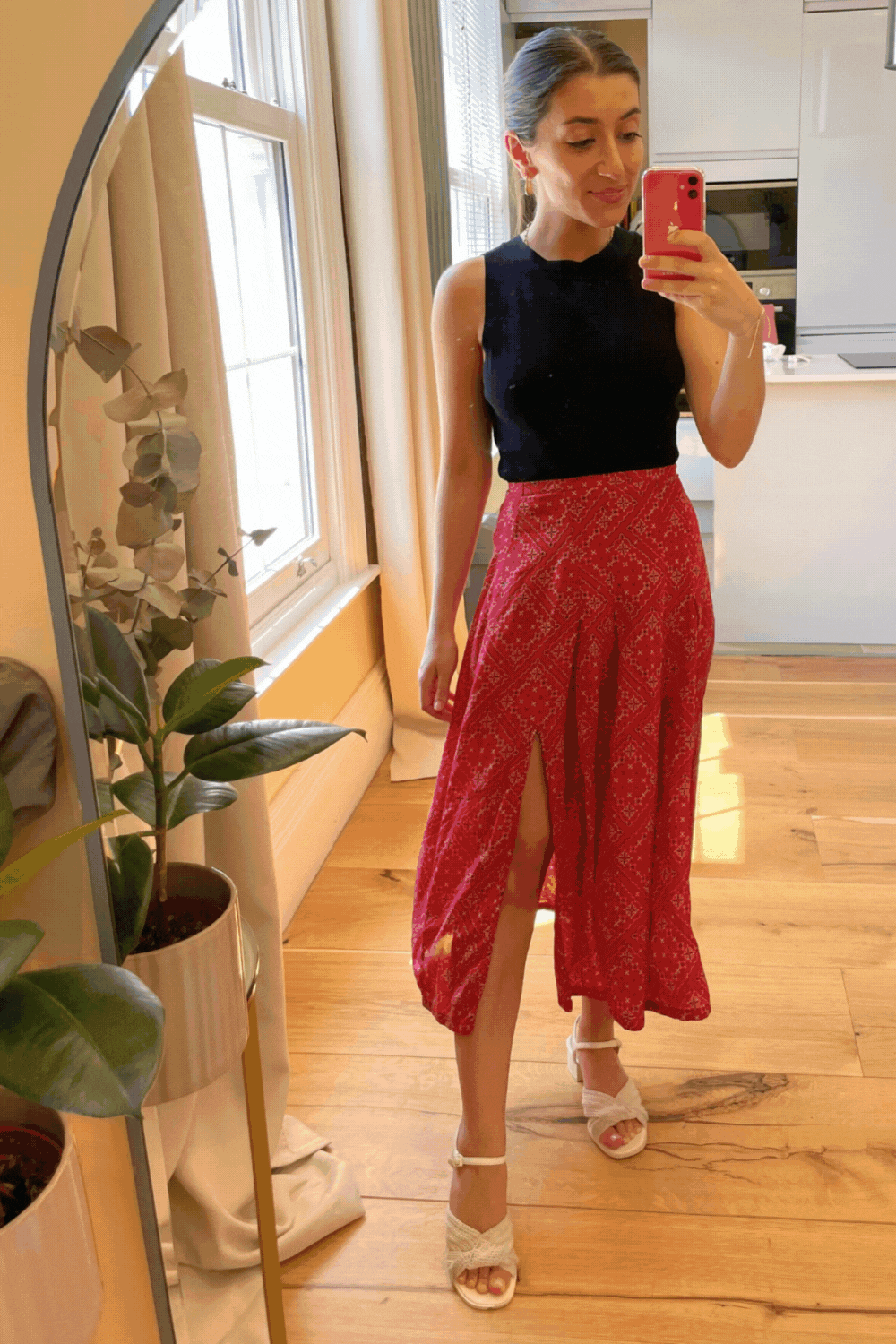 Fashion Editor Zoe Anastasiou wears midi skirt and tank top outfit formula