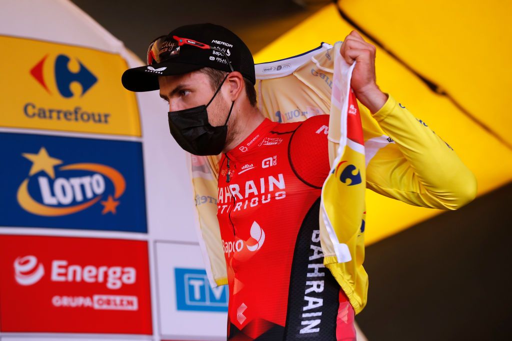 CHELM POLAND AUGUST 09 Phil Bauhaus of Germany and Team Bahrain Victorious Yellow Leader Jersey celebrates at podium during the 78th Tour de Pologne 2021 Stage 1 a 216km stage from Lublin to Chem 212m TourdePologne TDP2021 UCIWT on August 09 2021 in Chelm Poland Photo by Bas CzerwinskiGetty Images