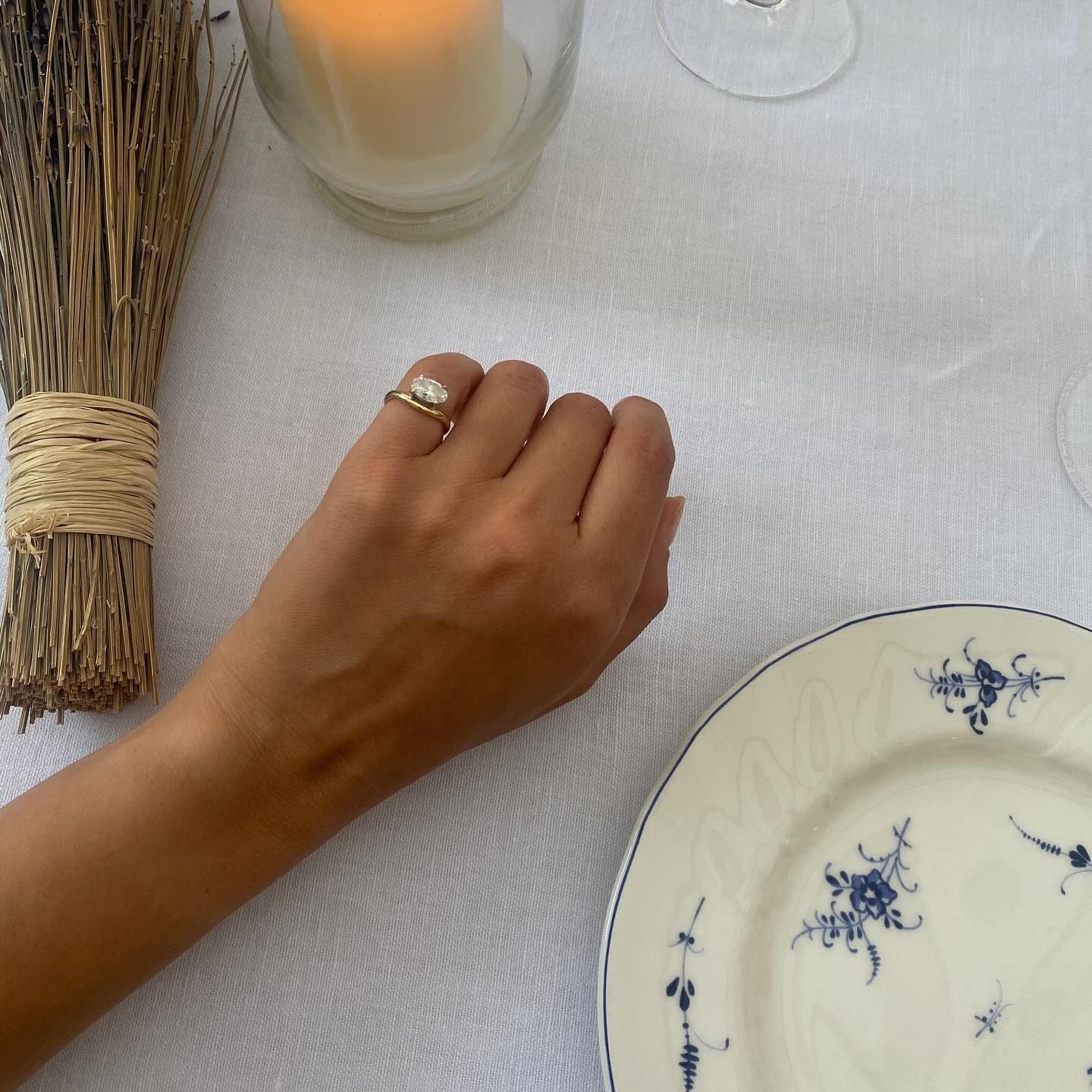 Woman wearing diamond pinkie ring