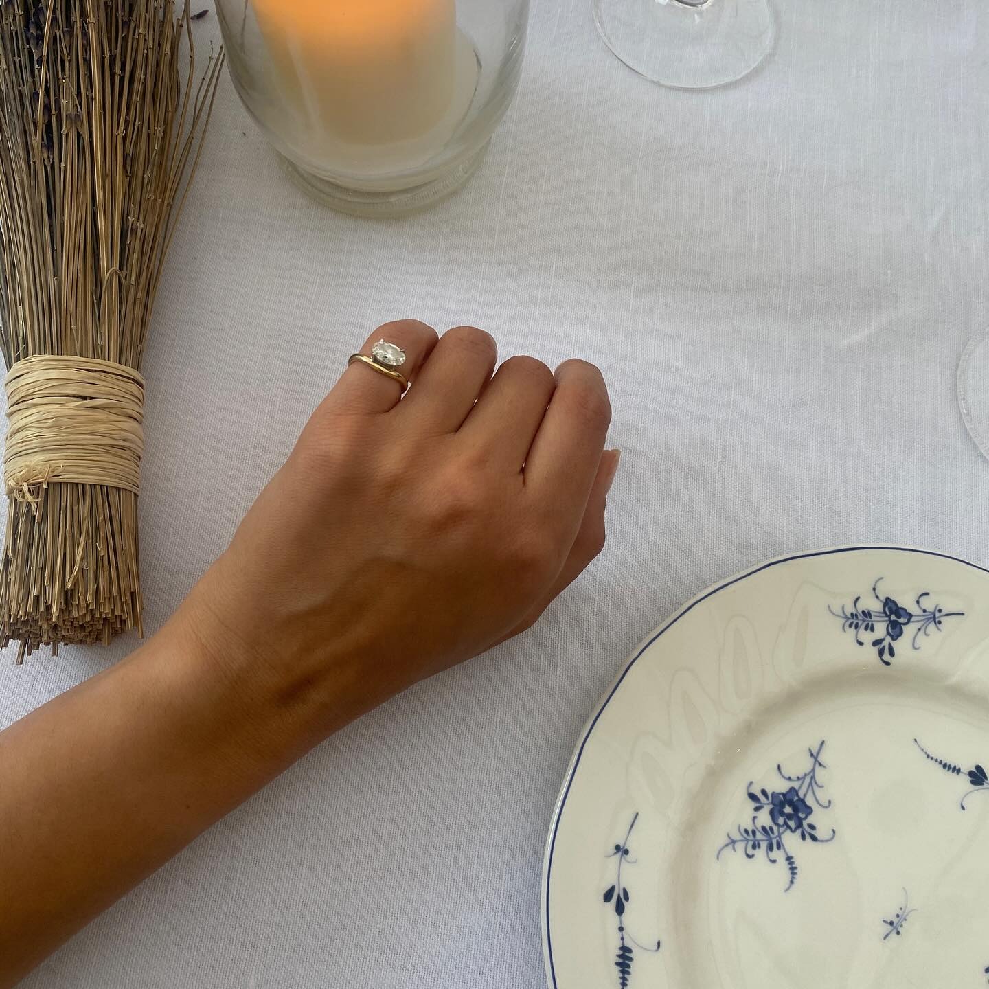 Woman wearing diamond pinkie ring