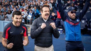 (L to R) Brett Goldstein as Roy Kent, Jason Sudeikis as Ted Lasso, and Brendan Hunt as Coach Beard in Ted Lasso season 3