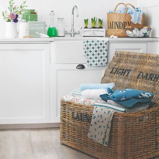 Laundry room with an open laundry basket