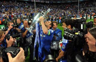 Lampard kisses the Champions League trophy after Chelsea's success in 2012