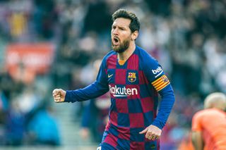 Lionel Messi celebrates after scoring a goal for Barcelona against Eibar at Camp Nou in February 2020.