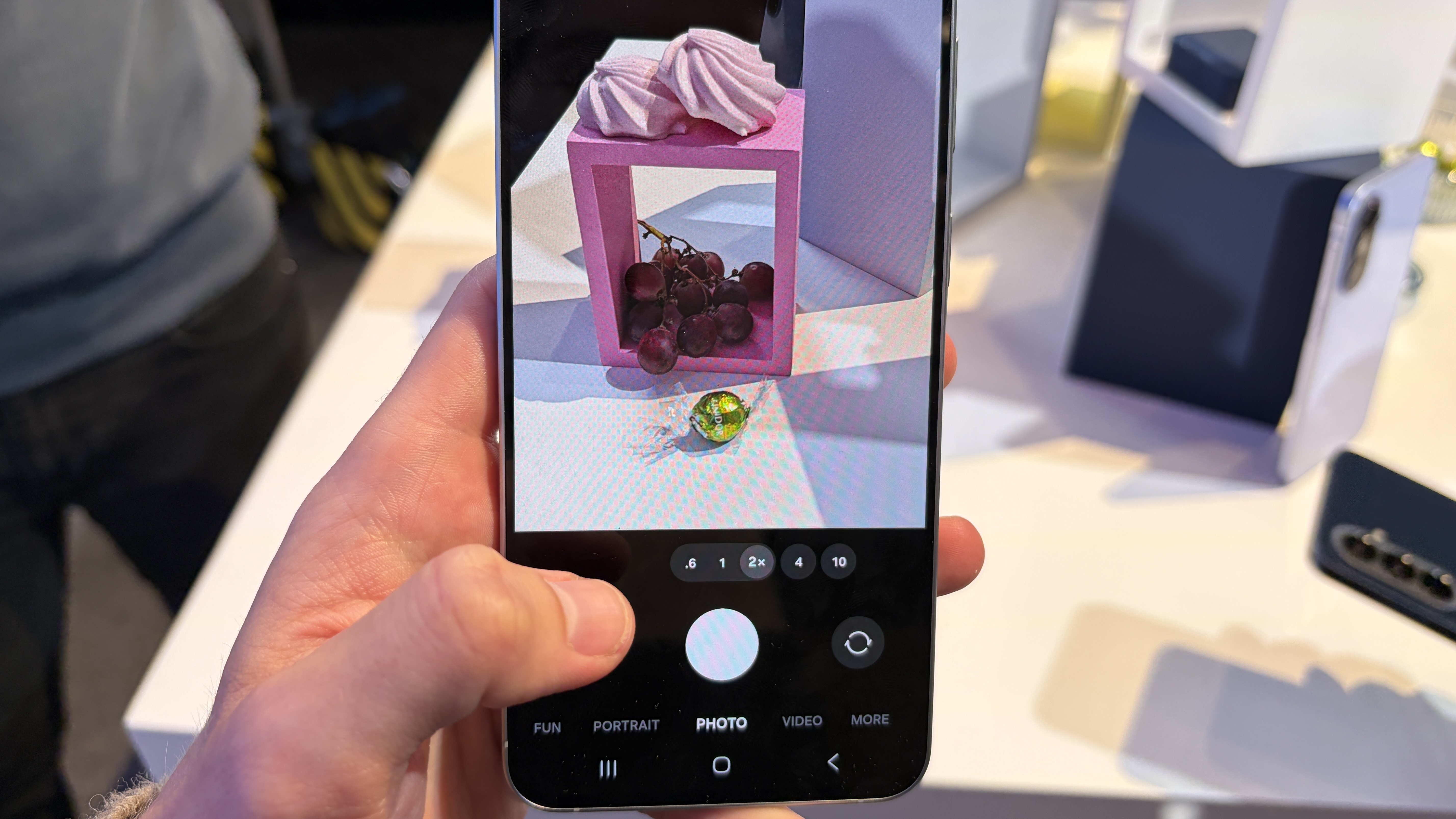 The Samsung Galaxy A57 being held in the hand