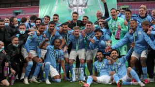 Man City celebrate their League Cup final win over Tottenham