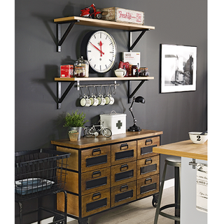 kitchen with black wall and wooden cupboards