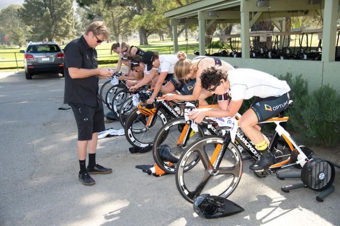 The women warm up on LeMond trainers before their TTT practice.