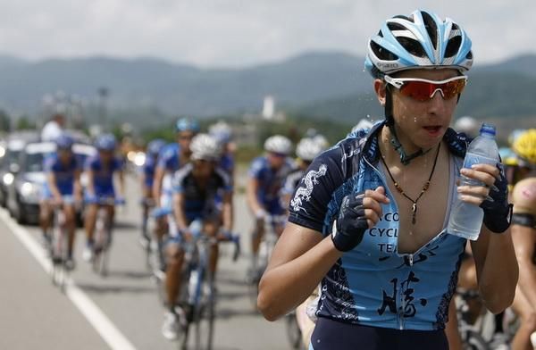 A Marco Polo Cycling Team rider cools down during the stage.