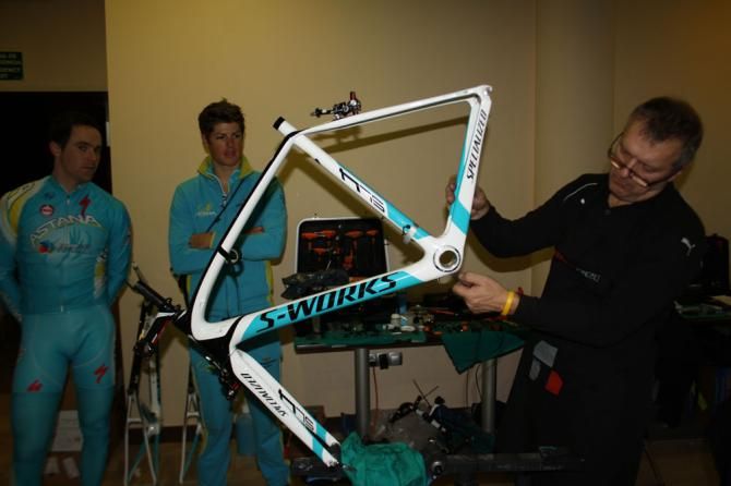 Jakob Fuglsang watches on as his bike is put together