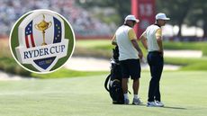 Main image of Justin Rose and his caddie Mark Fulcher during a practice round ahead of the 2025 Ryder Cup with an inset image (top left) of a Ryder Cup tee marker