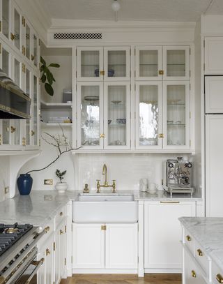 white kitchen with glass cabinets