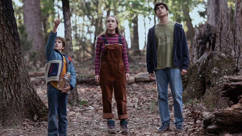 Arlo (Caleb Dolden), Meryl (Emilie Bierre) and Nicholas (Luciano Leroux) in the woods in Teacup