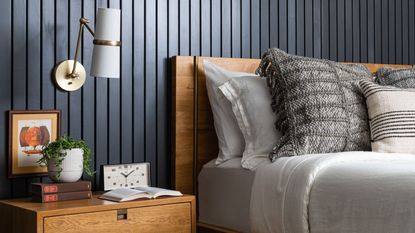 Luxury dorm room ideas from the Magnolia sale: Magnolia dorm room bedside with a vase and lamp