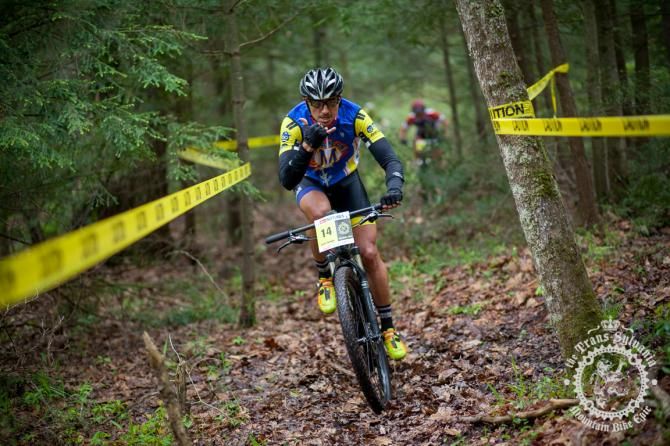 Carlos Rodriguez rides through taped singletrack sections of R.B.Winter State Park