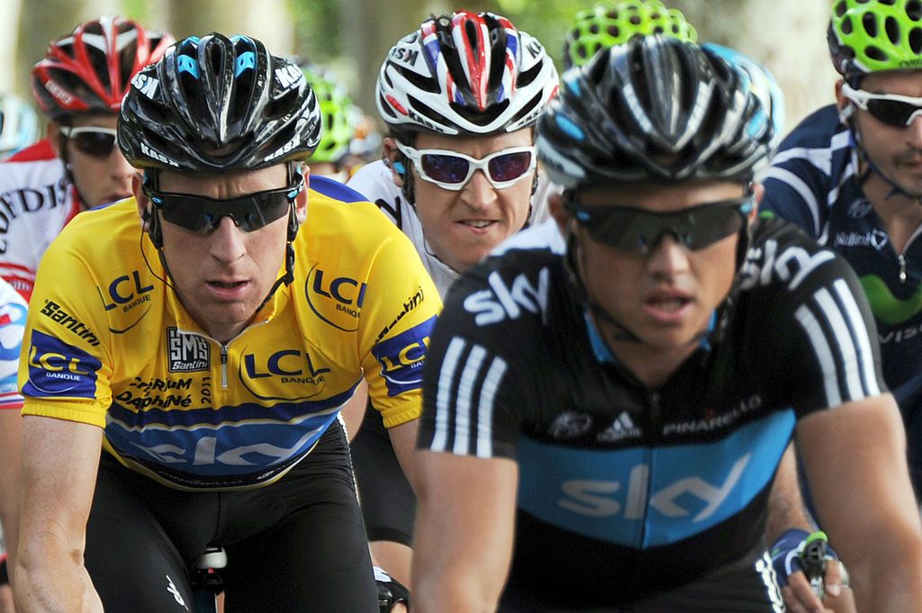 Britain yellow jersey Bradley Wiggins L rides during the fourth stage of the 63rd edition of the Criterium of Dauphine cycling race between La MotteServolex and Macon on June 09 2011 in Macon central France German rider John Degenkolb HTC won the sprint finish to take stage four of the Criterium but Britains Bradley Wiggins of Team Sky did enough to retain the overall leaders jersey AFP PHOTO PASCAL PAVANI Photo credit should read PASCAL PAVANIAFP via Getty Images