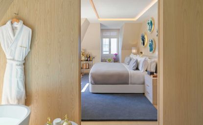 an image of the guest bedroom with a double bed in view