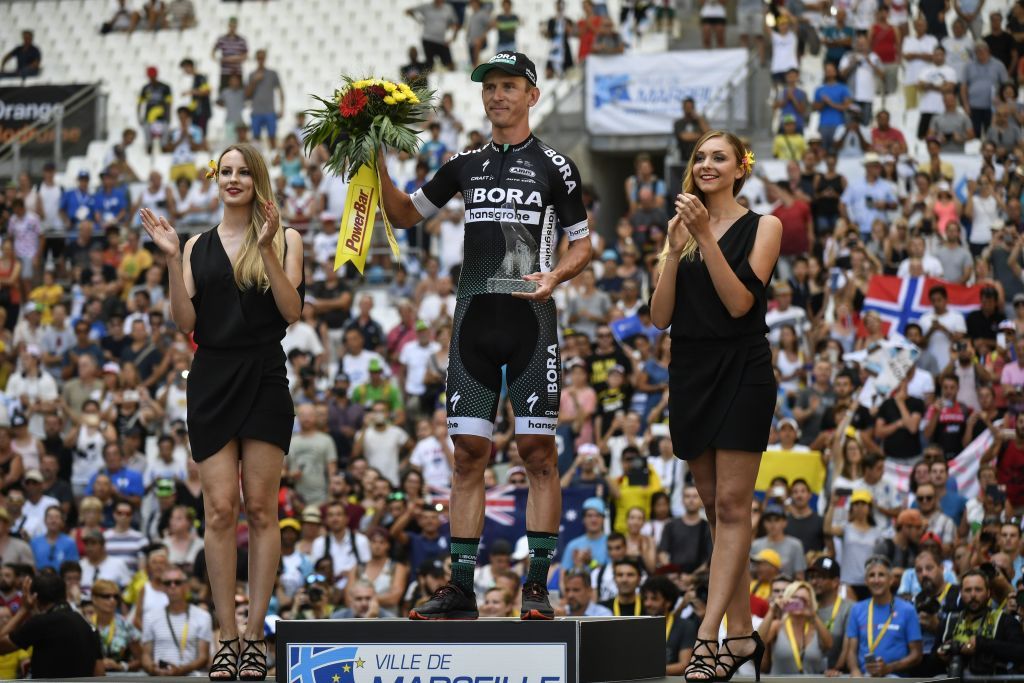 Maciej Bodnar on the podium after his stage 20 time trial victory at the Tour de France