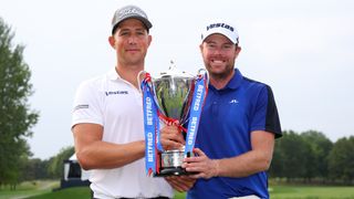 Niklas Norgaard and Kasper Broch Estrup with the British Masters trophy