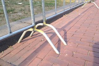 Some barriers in use alongside the route at the Eneco Tour have legs that protrude onto the course (Abraham)