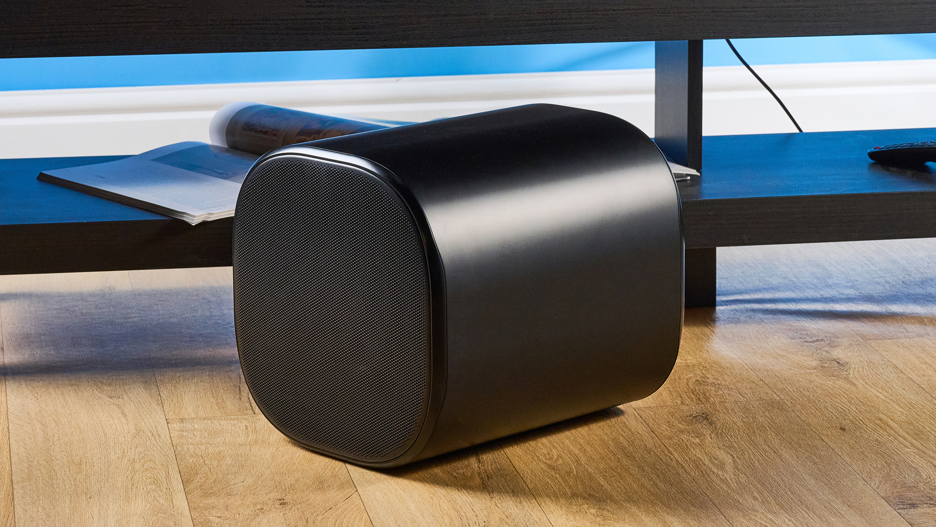 the jbl bar 1300xmk2 in black photographed against the blue tom's guide background