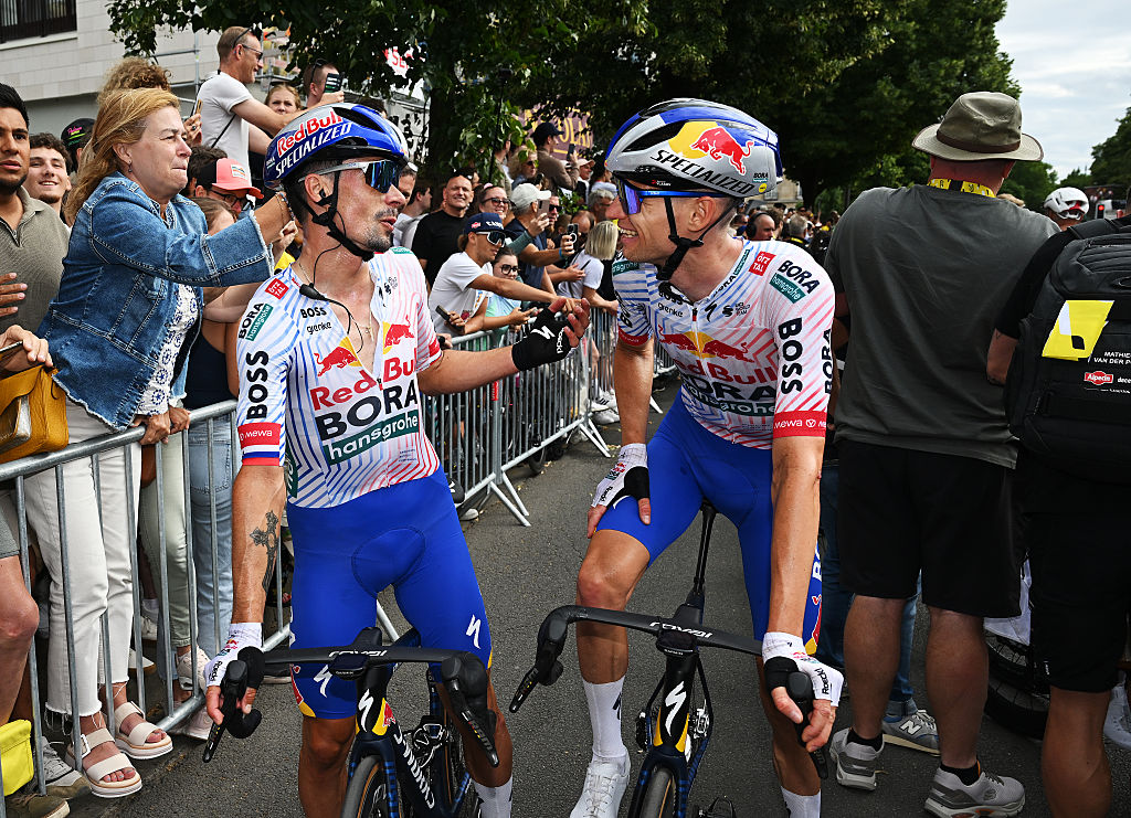 Primoz Roglic of Slovenia and Aleksandr Vlasov of Russia and Team Red Bull - BORA - hansgrohe react after the 112th Tour de France 2025, Stage 1