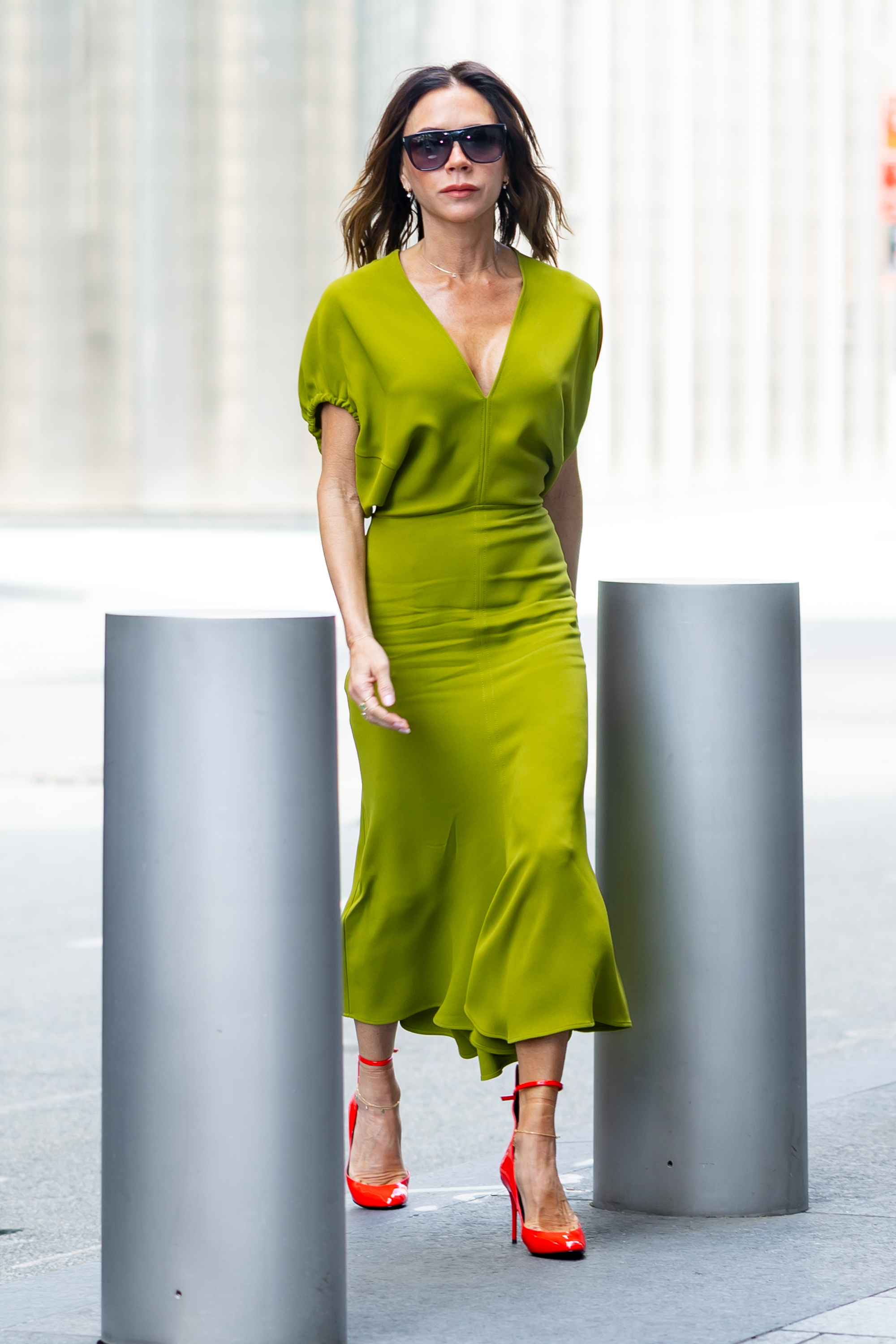 Victoria Beckham was spotted in NYC in Oct. 2024 wearing olive green and cherry red