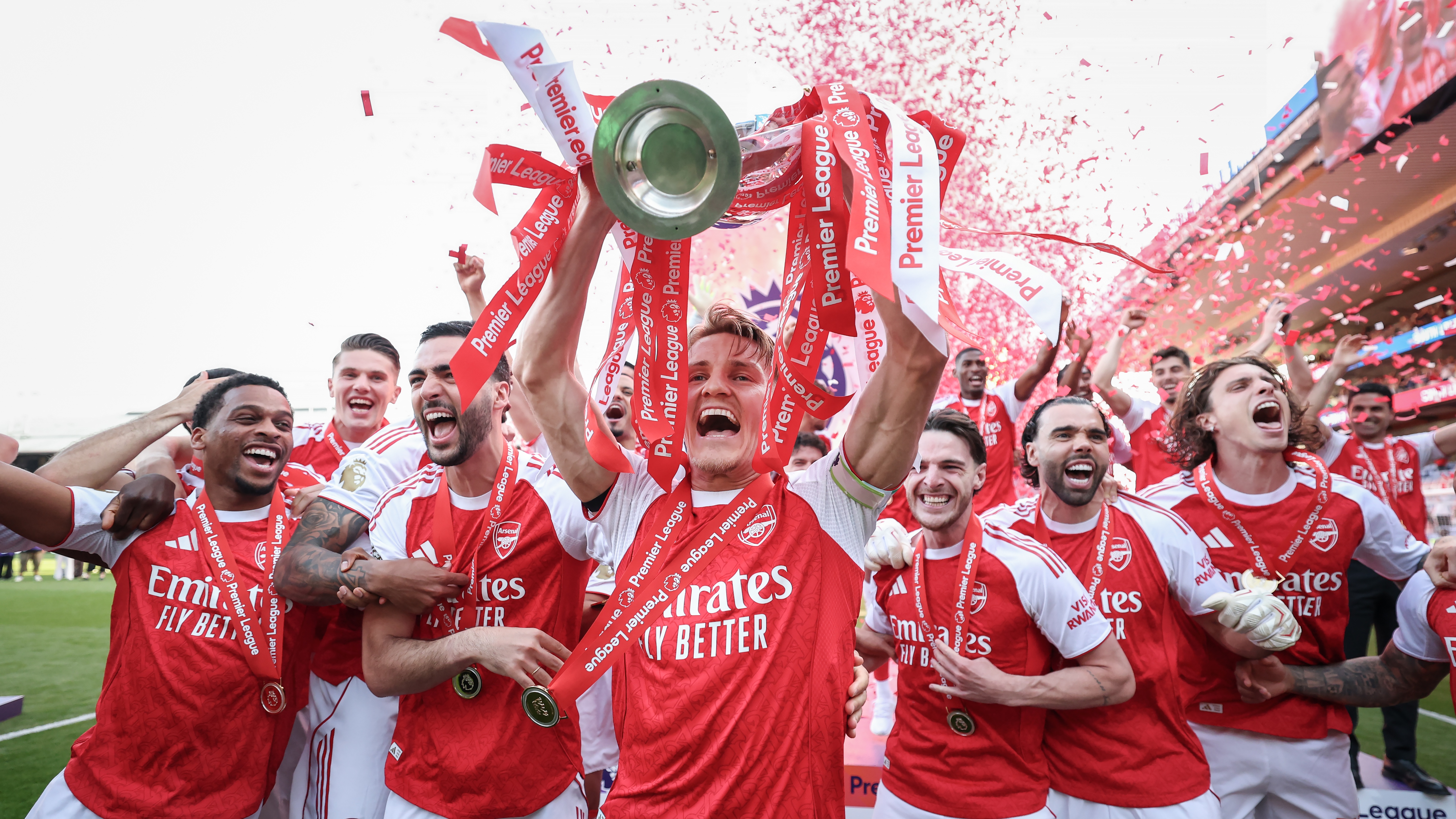 Martin Odegaard of Arsenal lifts the Premier League trophy during the Premier League match between Crystal Palace and Arsenal at Selhurst Park on May 24, 2026 in London, England