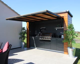 outdoor kitchen inside a bespoke garden room