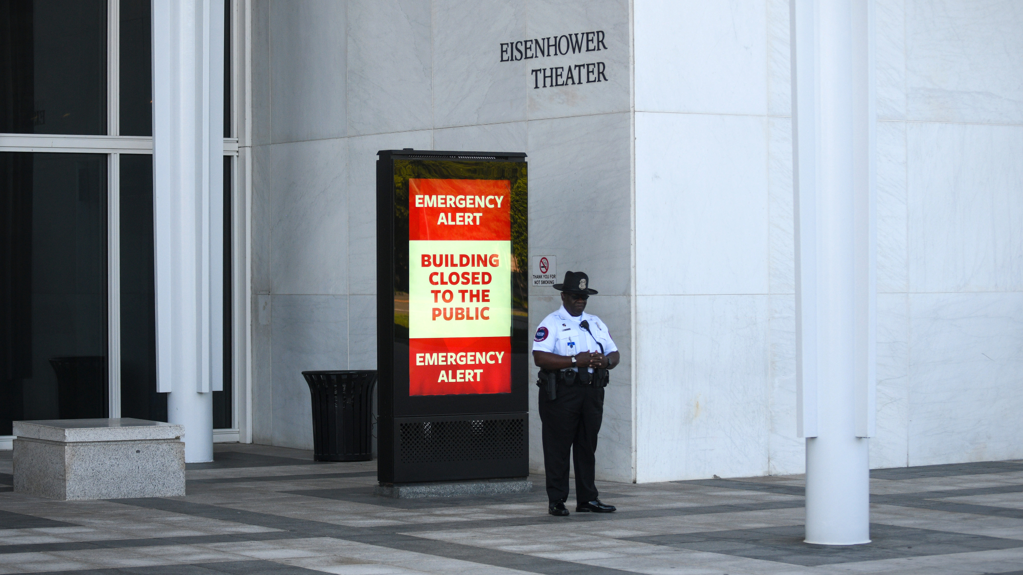 A security officer guards the entrance area at the John F. Kennedy Center for the Performing Arts in Washington, D.C.