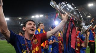 ROME, ITALY - MAY 27: Lionel Messi and Barcelona players celebrate after the UEFA Champions League final between Barcelona and Manchester United at the Stadio Olympico on May 27, 2009 in Rome, Italy. (Photo by Etsuo Hara/Getty Images)