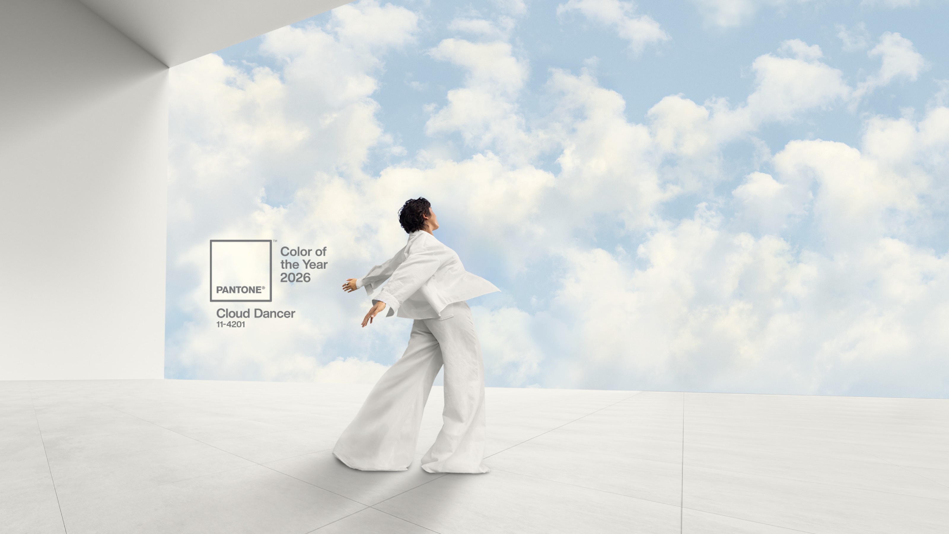 Pantone colour of the year 2026, Cloud Dancer, on a background of a cloudy sky with a dancing man dressed in white