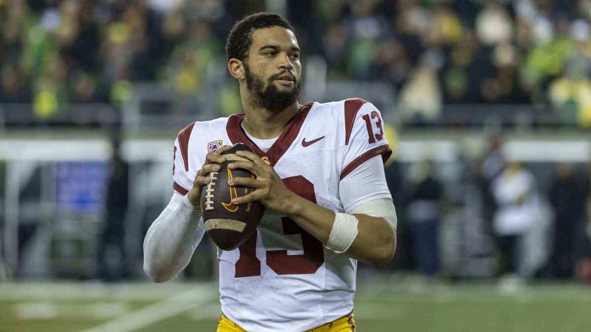 QB Caleb Williams with the ball in his hands as a college player