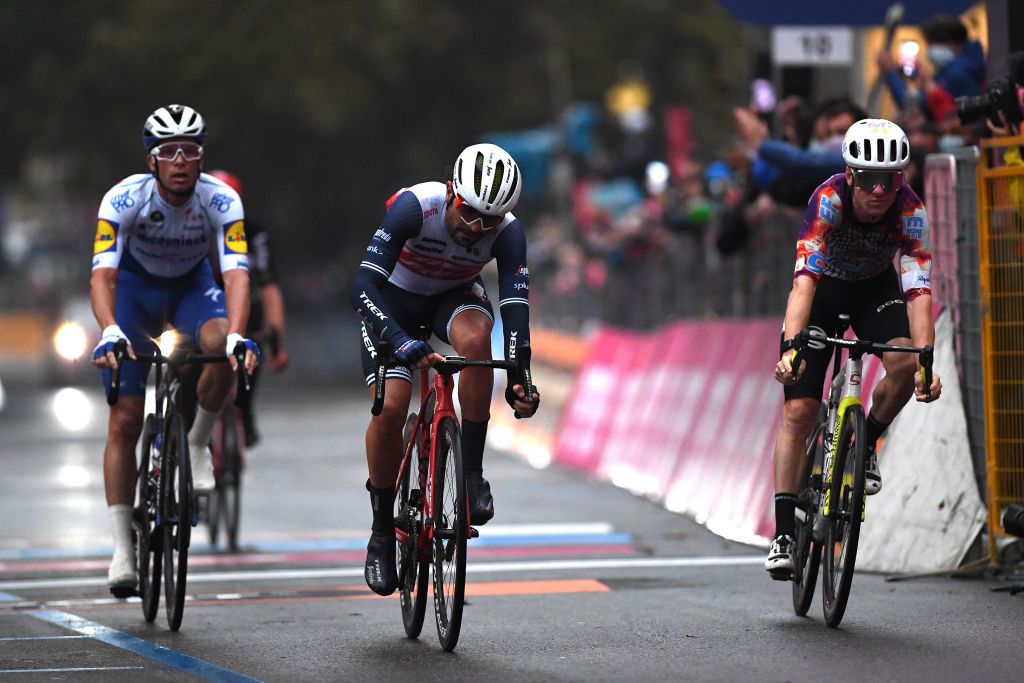 ASTI ITALY OCTOBER 23 Arrival Sprint Iljo Keisse of Belgium and Team Deceuninck QuickStep Jacopo Mosca of Italy and Team Trek Segafredo Simon Clarke of Australia and Team EF Pro Cycling during the 103rd Giro dItalia 2020 Stage 19 a 1245km stage from Abbiategrasso to Asti Stage shortened due to heavy rain girodiitalia Giro on October 23 2020 in Asti Italy Photo by Tim de WaeleGetty Images