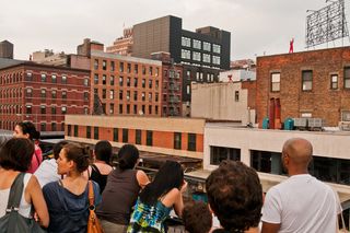 visitors strolled along the High Line to see them from different vantage points